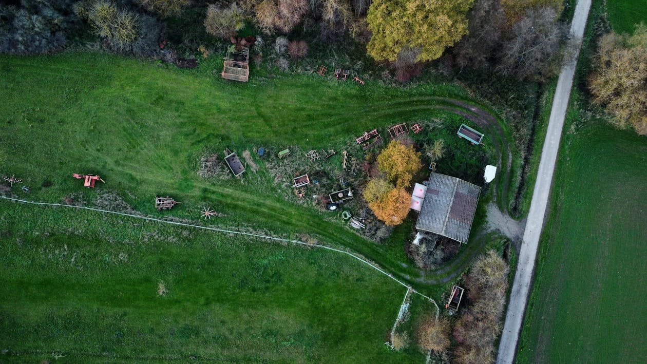 Aerial view of Irish countryside with farm buildings and green fields