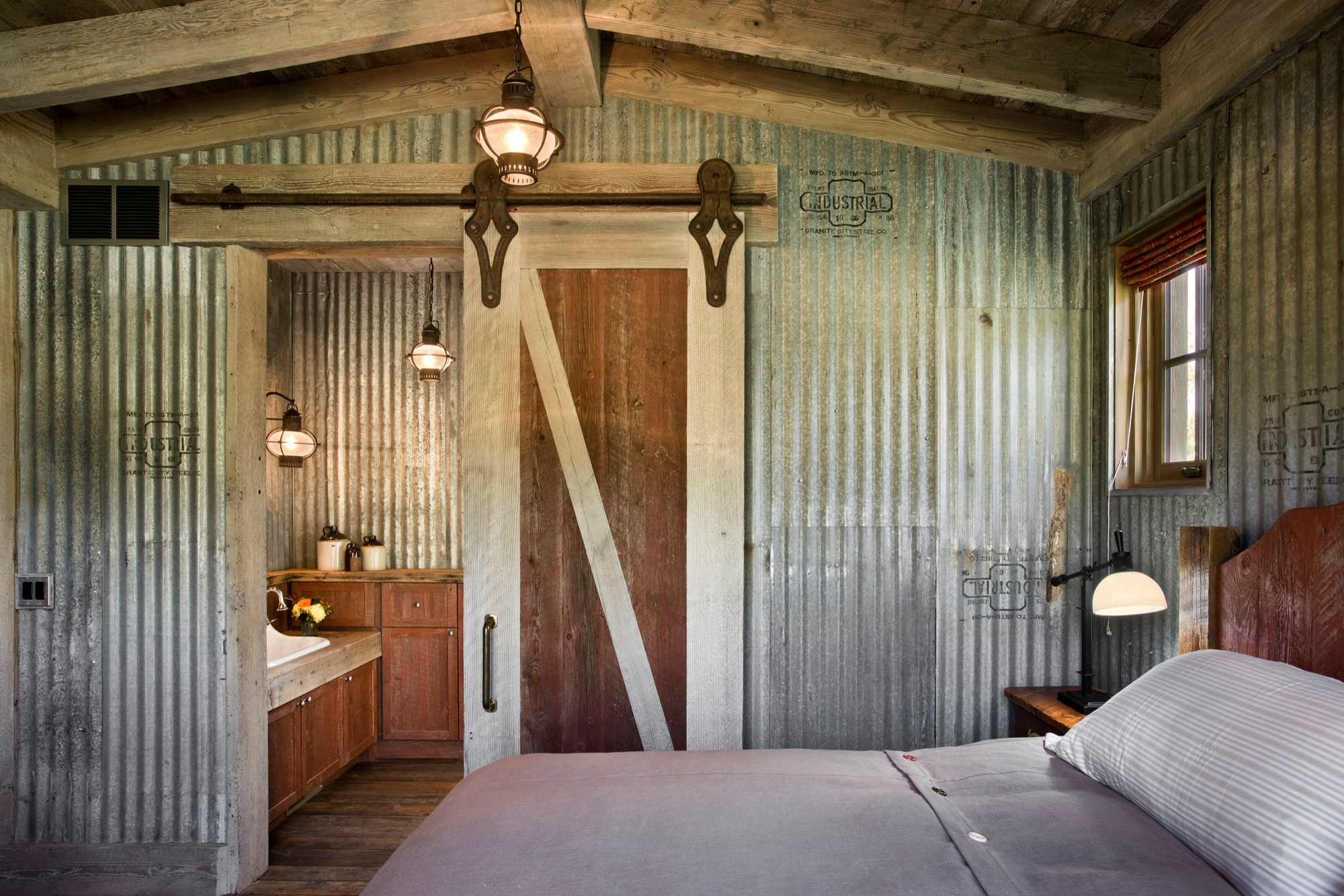 Farm outbuildings with painted cladding in Irish countryside